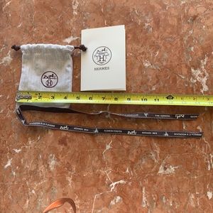 Hermès original 4by5 1/4” pouch for Belt or jewelry + 29” ribbon & envelope.